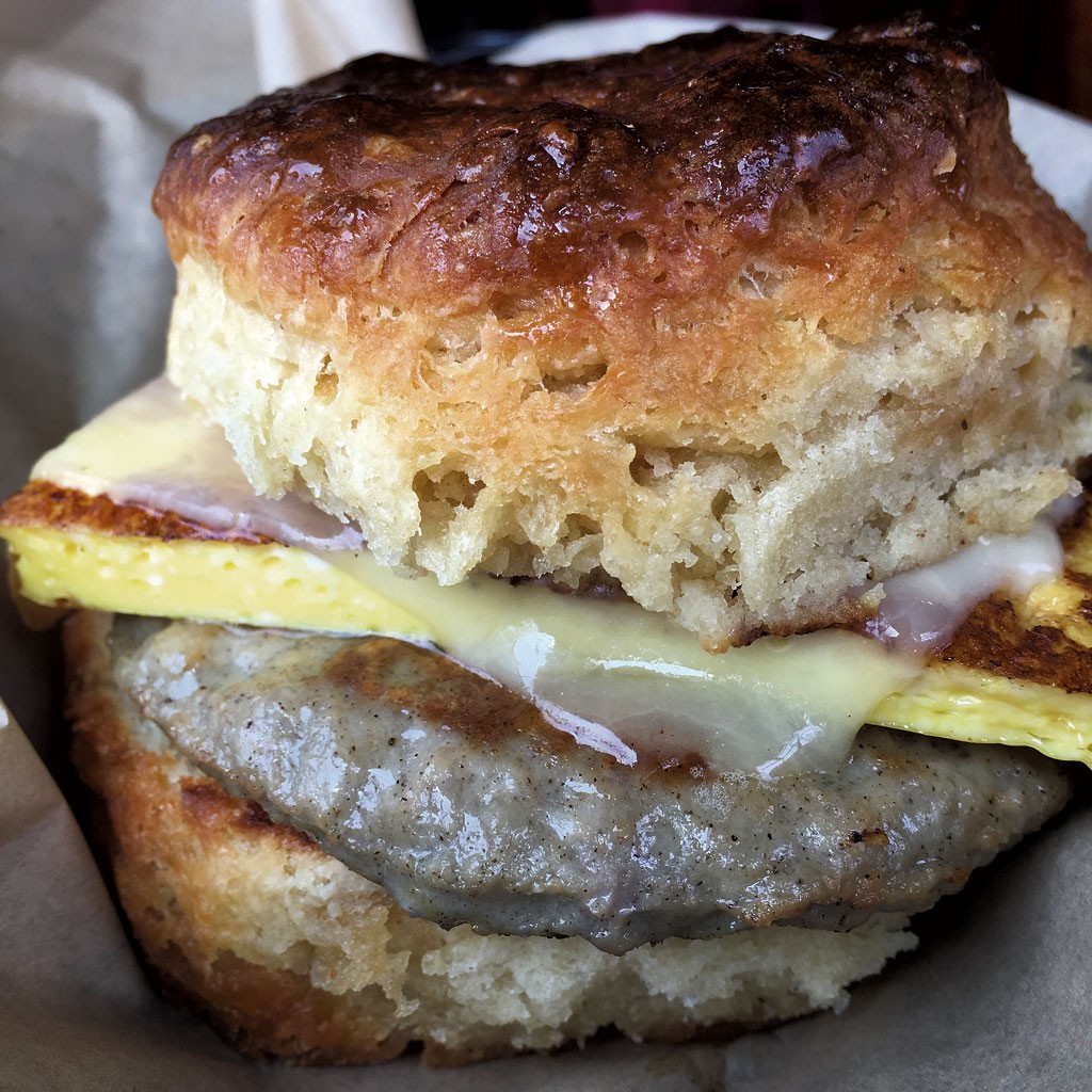 Breakfast sandwich on a maple biscuit at August First Bakery (Melissa Pasanen)