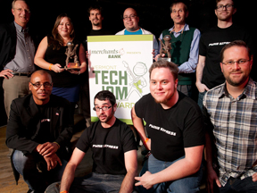 2013 File Photo: Former Merchants Bank President and CEO Mike Tuttle with Tech Jam award winners from Pwnie Express and FreshTracks Capital
